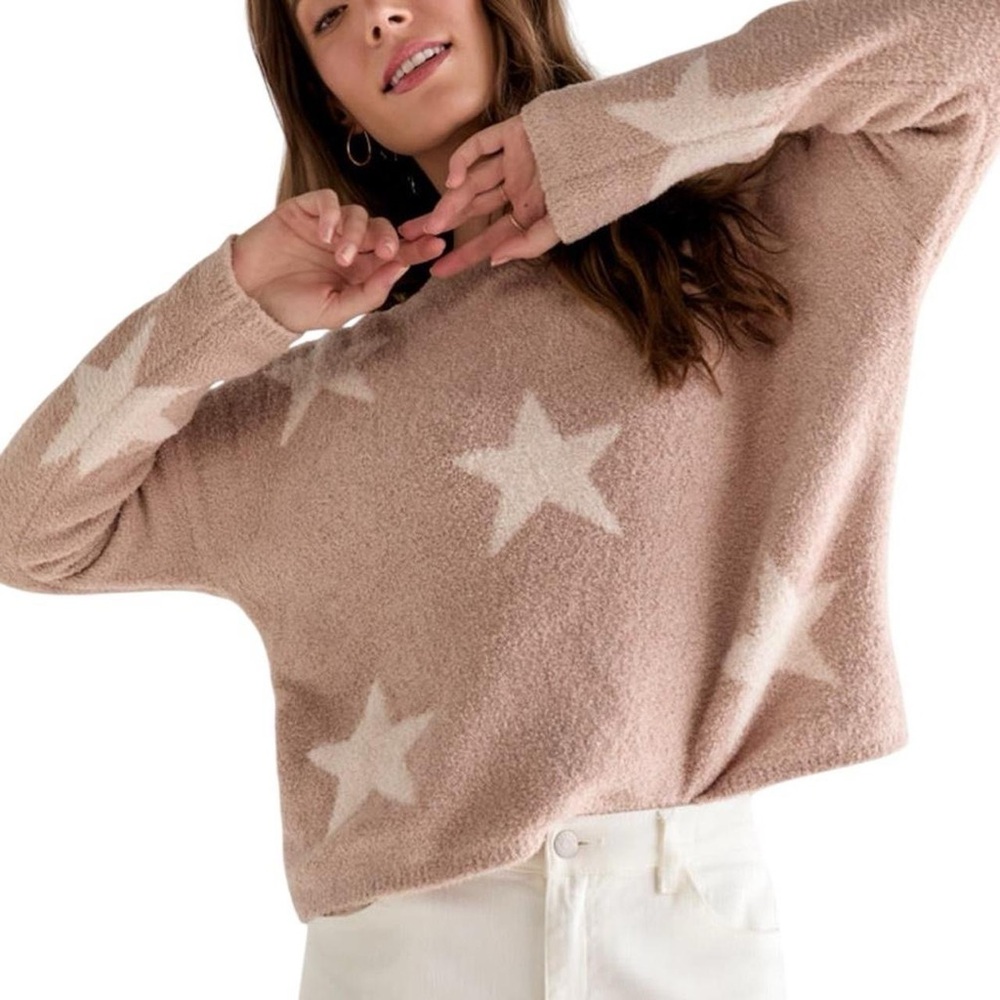 Francesca’s Harper Heritage Star Teddy Sweater.